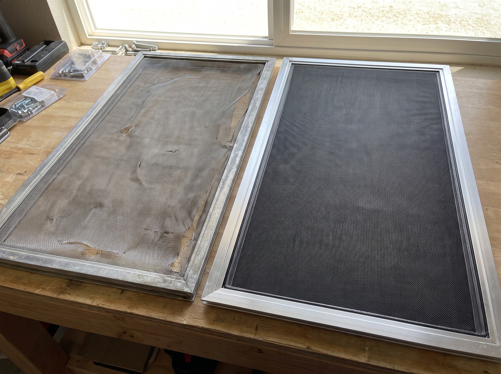 Comparison of an old worn screen and a freshly rescreened screen in Spokane.